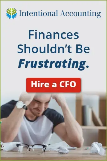 Frustrated man looking at papers, with the button "Hire a CFO."
