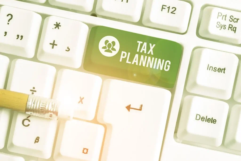 Button on a keyboard labeled Tax Planning.